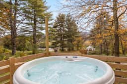 Haven Tiny House w hot tub on river near Stowe