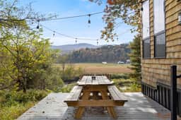 Haven Tiny House w hot tub on river near Stowe
