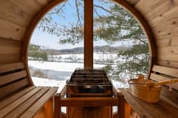Caboose Tiny Home on river with hot tub near Stowe
